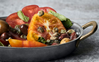 Tomato salad with capers, olive and mint